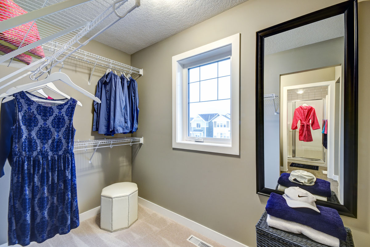 Get ready for the day in the beautiful walk-in closet of the Banbury II model.