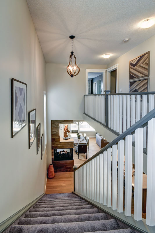 Looking down the stairs in the Hamilton Wil model home from Nuvista Homes.