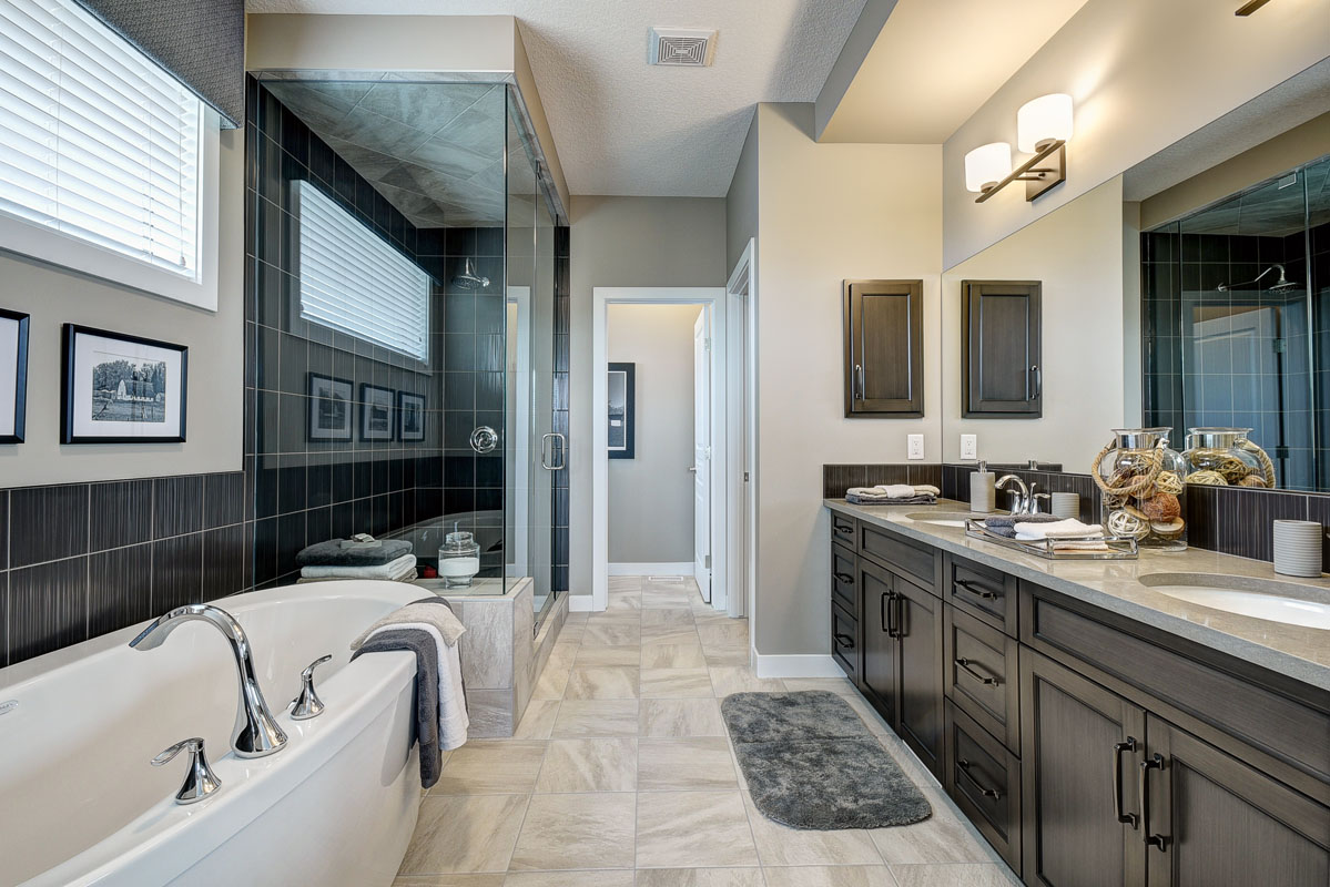 Ensuite bathroom in the Saffron model home with large soaker tub and double custom vanity.